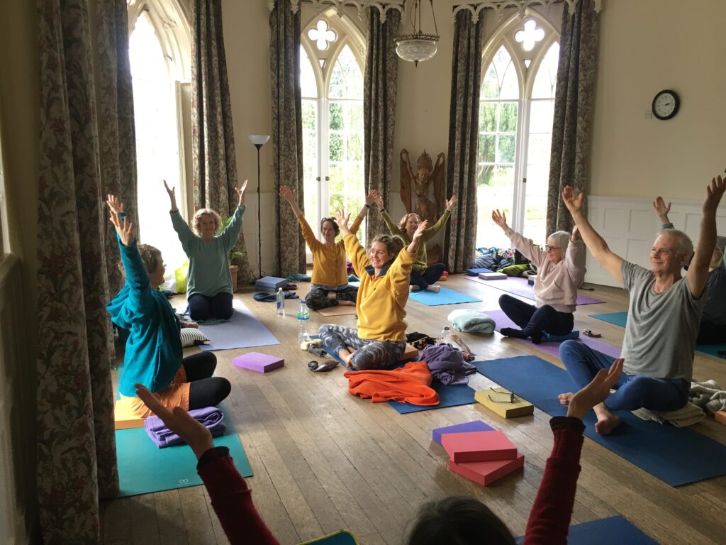 Finding joy through yoga on retreat with Pippa doing 'Heaven rushing in' pose